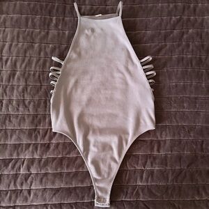 Stylish Gray Bodysuit with Side Cutouts